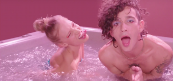 Watch The 1975 Mock Celeb & Digital Culture in “Love Me” Video